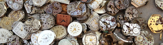 A pile of broken watches